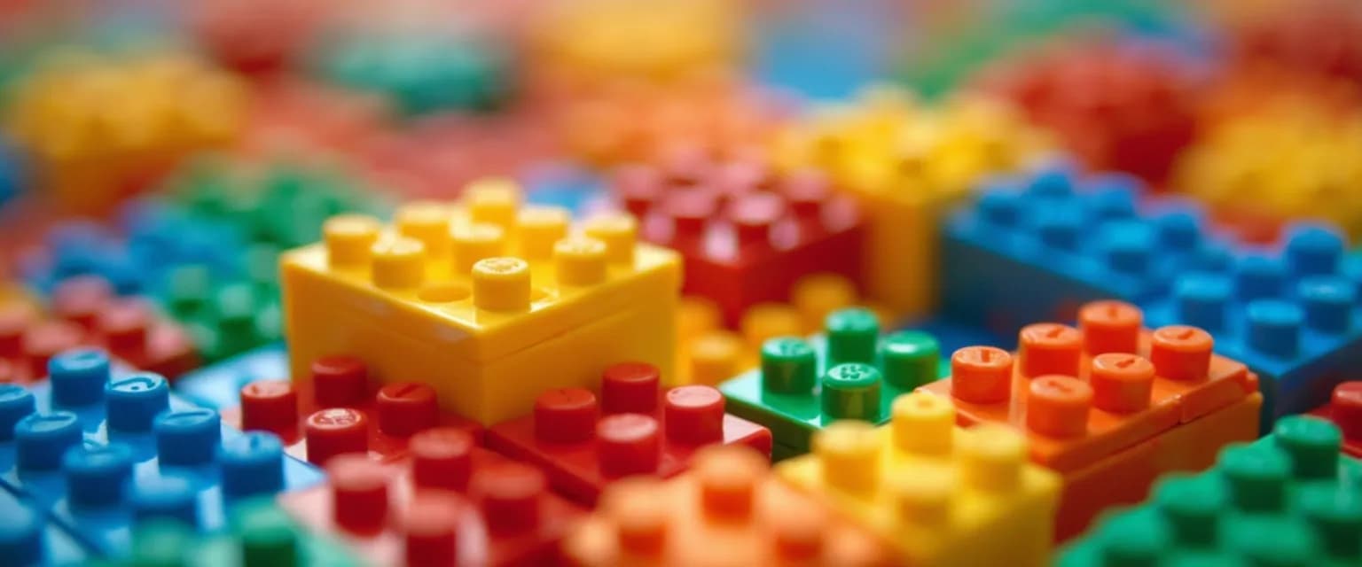 Colorful LEGO bricks arranged to represent training your creative mind through unexpected combinations